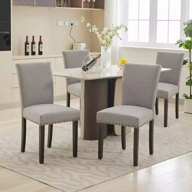 Lot de 2 chaises de salle à manger rembourrées, chaises Parsons ergonomiques à dossier haut en tissu avec garniture cloutée pour cuisine/salle à manger/hôtel