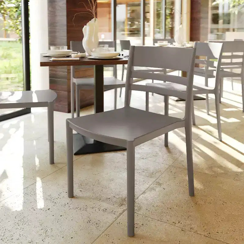 Flash Furniture Bridgeport Set of 4 Indoor-Outdoor Stacking Patio Chair with Slatted Backrest, Commercial All-Weather Resin Chair