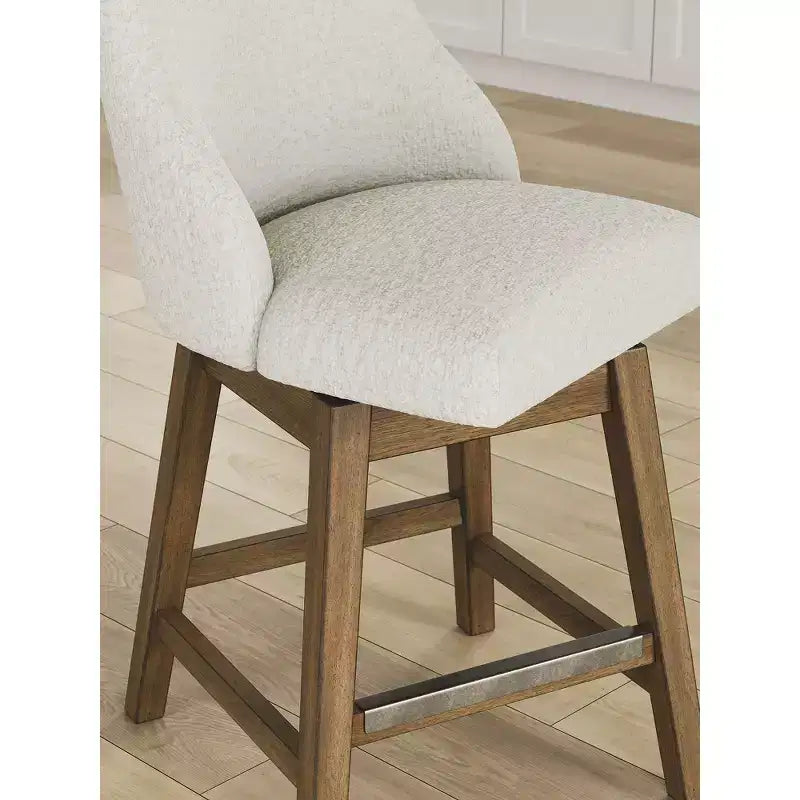 Signature Design by Ashley Cabalynn Counter Height Upholstered Swivel Barstools, Set of 2, Light Brown Frame with Cushioned Oatmeal Seat